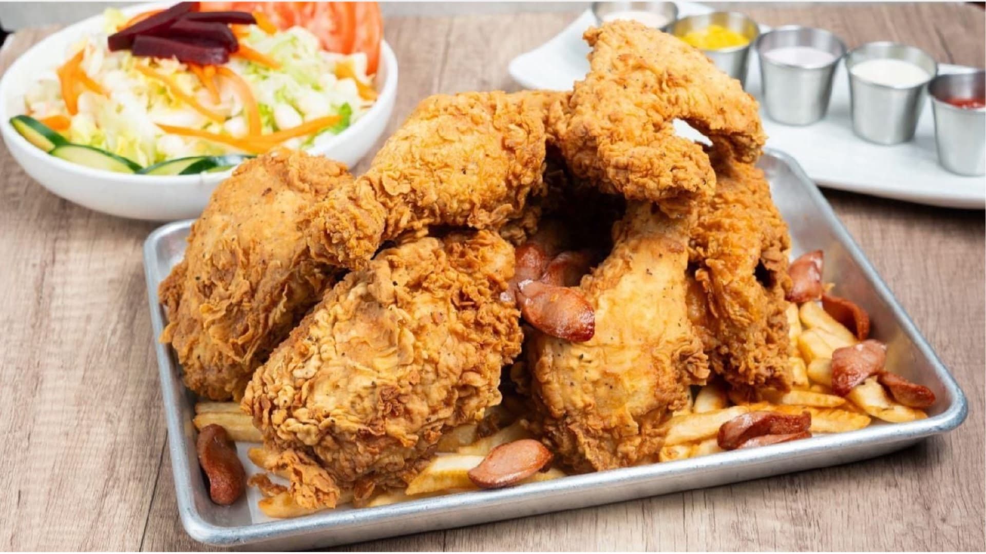 Crispy golden fried chicken pieces ready for delivery